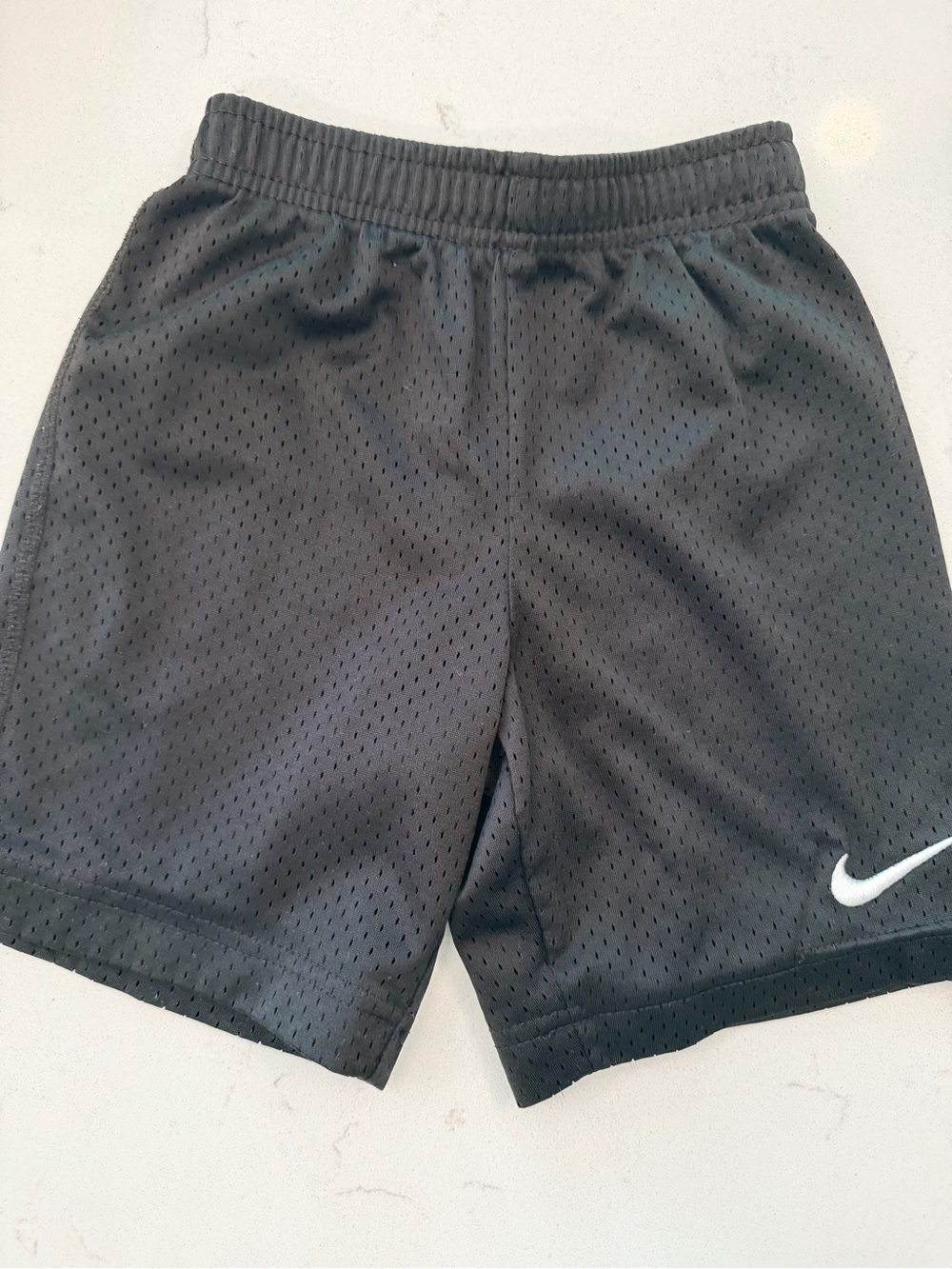 Nike Black Mesh Athletic Shorts with White Swoosh - Kids